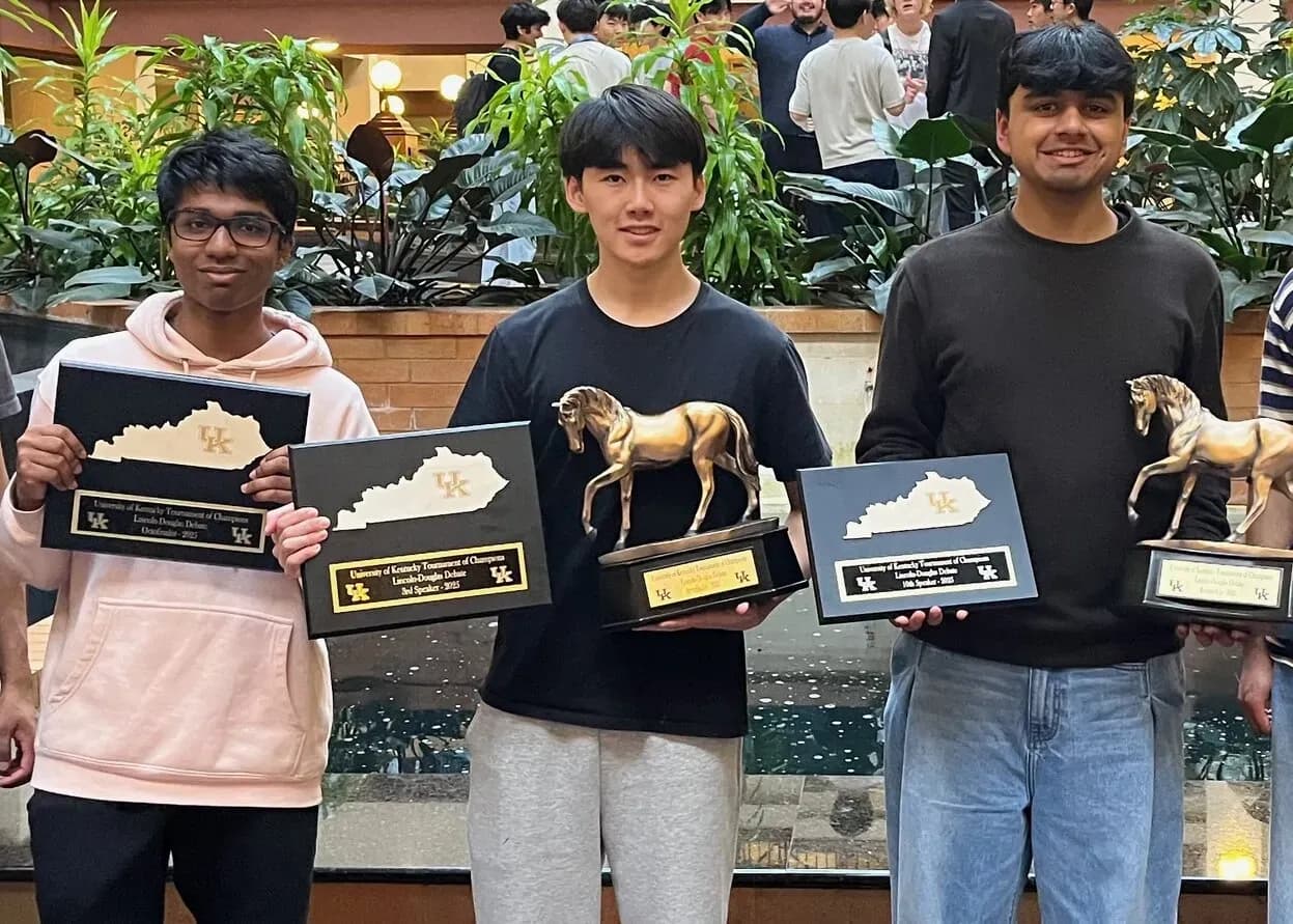 CME students holding trophies at the 2025 TOC